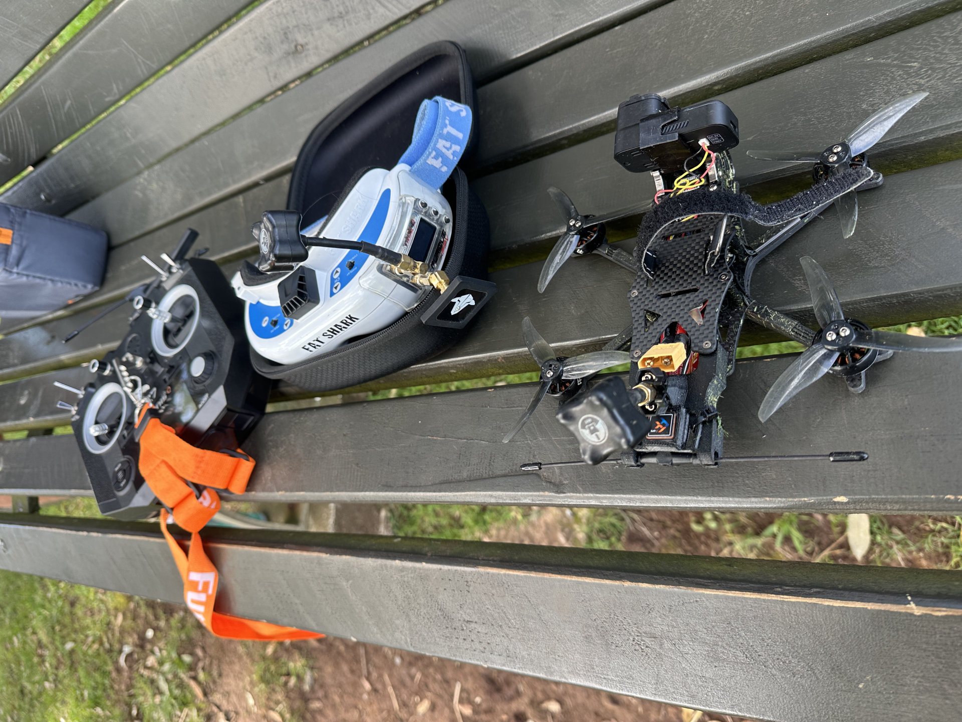 FPV goggles, radio controller and drone